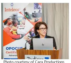Dr Luciana Young giving a speech at a podium
